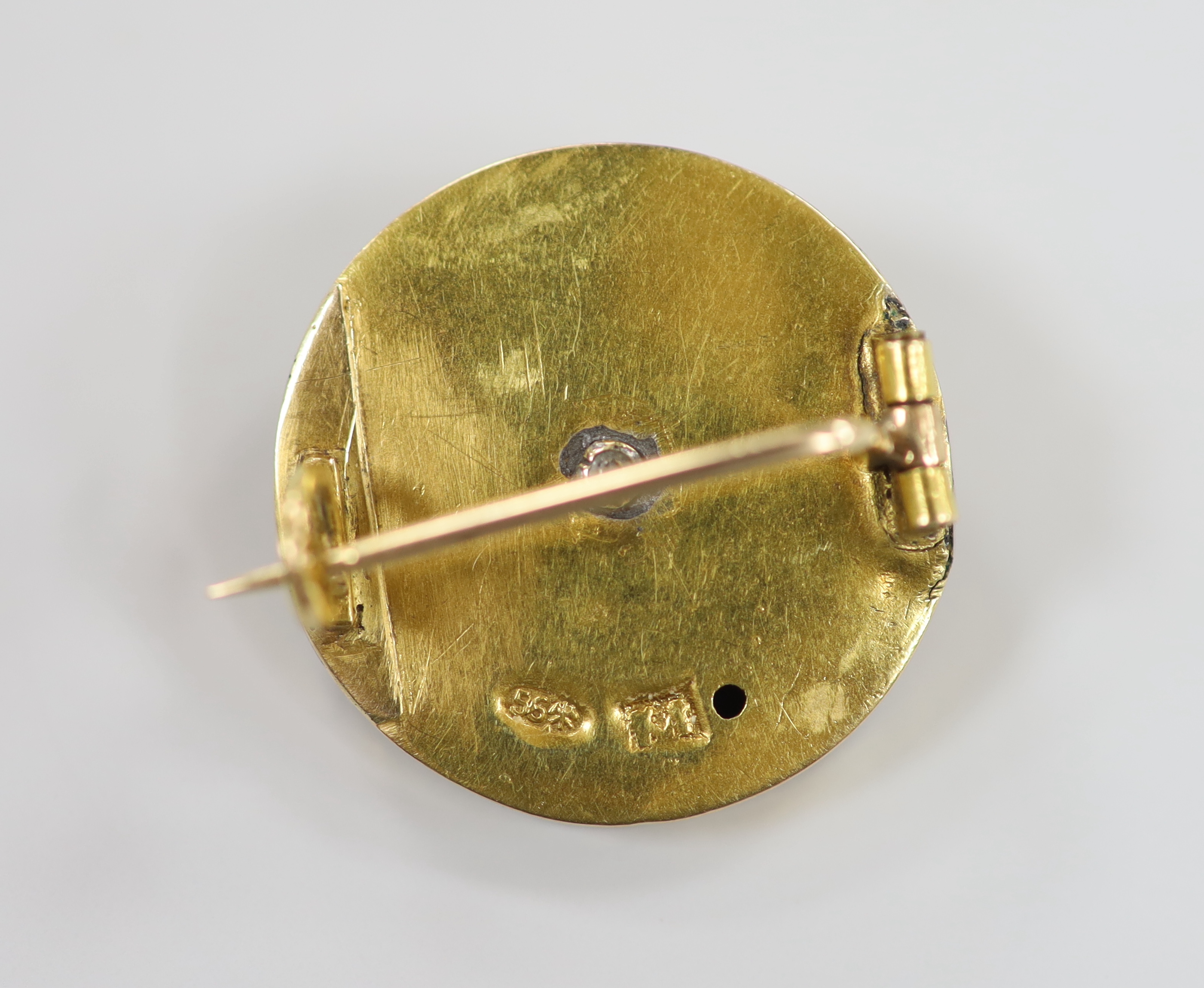 An early 20th century Russian 56 zolotnik yellow metal and seed pearl set circular brooch, 22mm, gross weight 3.4 grams.